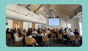 Image shows a healthcare professional audience observing a presentation at a PRDA professional networking event